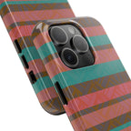 Striped Tribal Tough Phone Case — Retro Teal & Coral Protective Cover in lifestyle display beside a notebook as a fractyl shockproof iphone 17 pro case