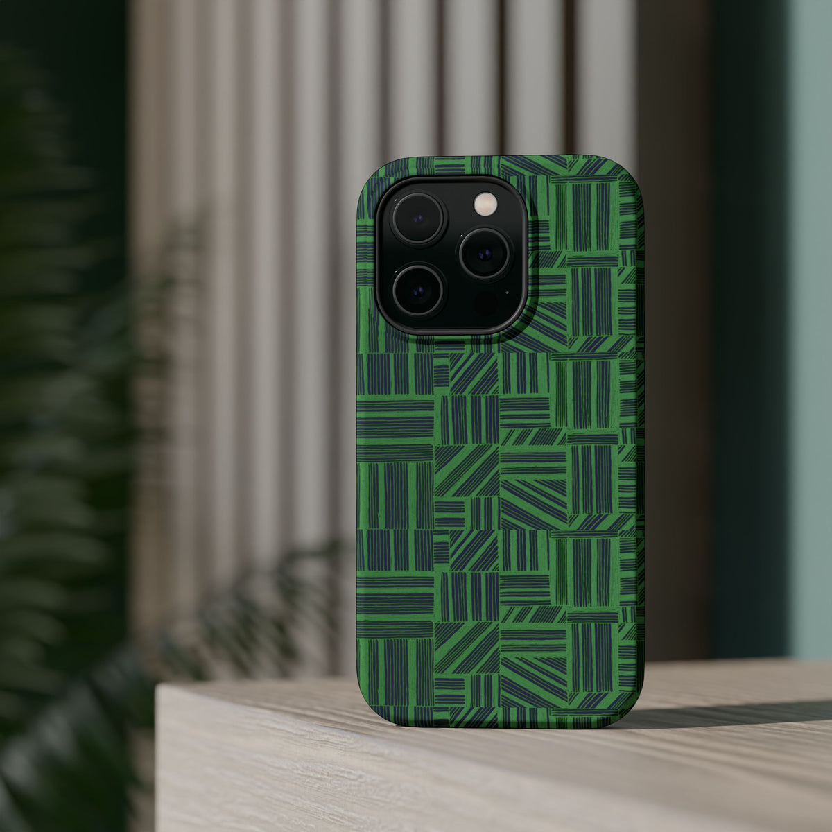 Green Magnetic Phone Case — 2-Layer Geometric MagSafe-Compatible Impact-Resistant Cover, green magnetic phone case- price match with CASETiFY and Casely, green geometric phone case angled in a modern product scene.