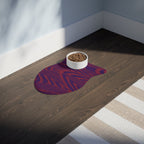 The beautifully styled Pet Feeding Mat resting on the floor, showcasing a striking purple and red wood grain design. This memory foam dog mat adds both flair and functionality as a non-slip mat for feeding pets. It's a versatile option for pet owners seeking a washable mat that blends seamlessly into any contemporary home.