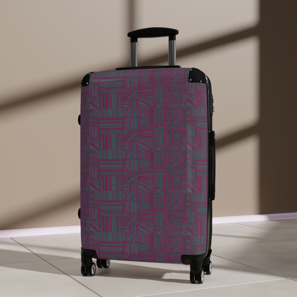 Geometric Plum Carry-On Suitcase – Stylish Patterned Rolling Luggage, three-quarter indoor view of an expandable carry on suitcase showcasing its colorful geometric front, black protective corners, and telescopic handle.