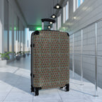 Houndstooth Carry-On Suitcase – Retro Red & Green Patterned Travel Luggage, hard shell carry on angled in an airport terminal with four double wheels