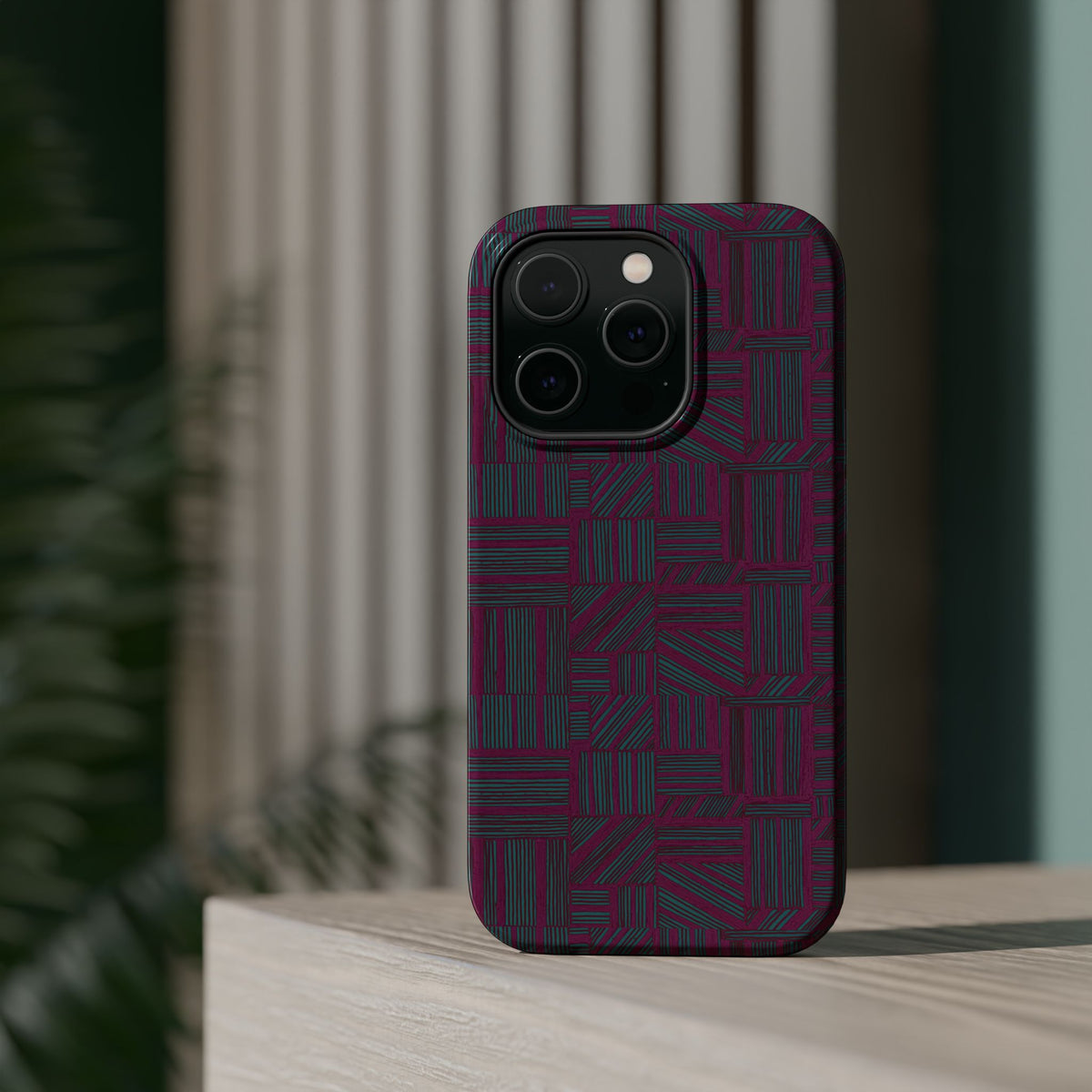 Slim Protective Phone Case With MagSafe, Dual-Layer Impact Protection, Plum Geometric Design, close-up view of durable camera protection and geometric lines; slim protective iphone 16 promax  case.