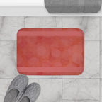Coral Glow Bath Mat — Soft Blush Bokeh Bathroom Rug placed in a cozy bathroom setting, showcasing its stylish design and functionality as an absorbent bathroom rug.