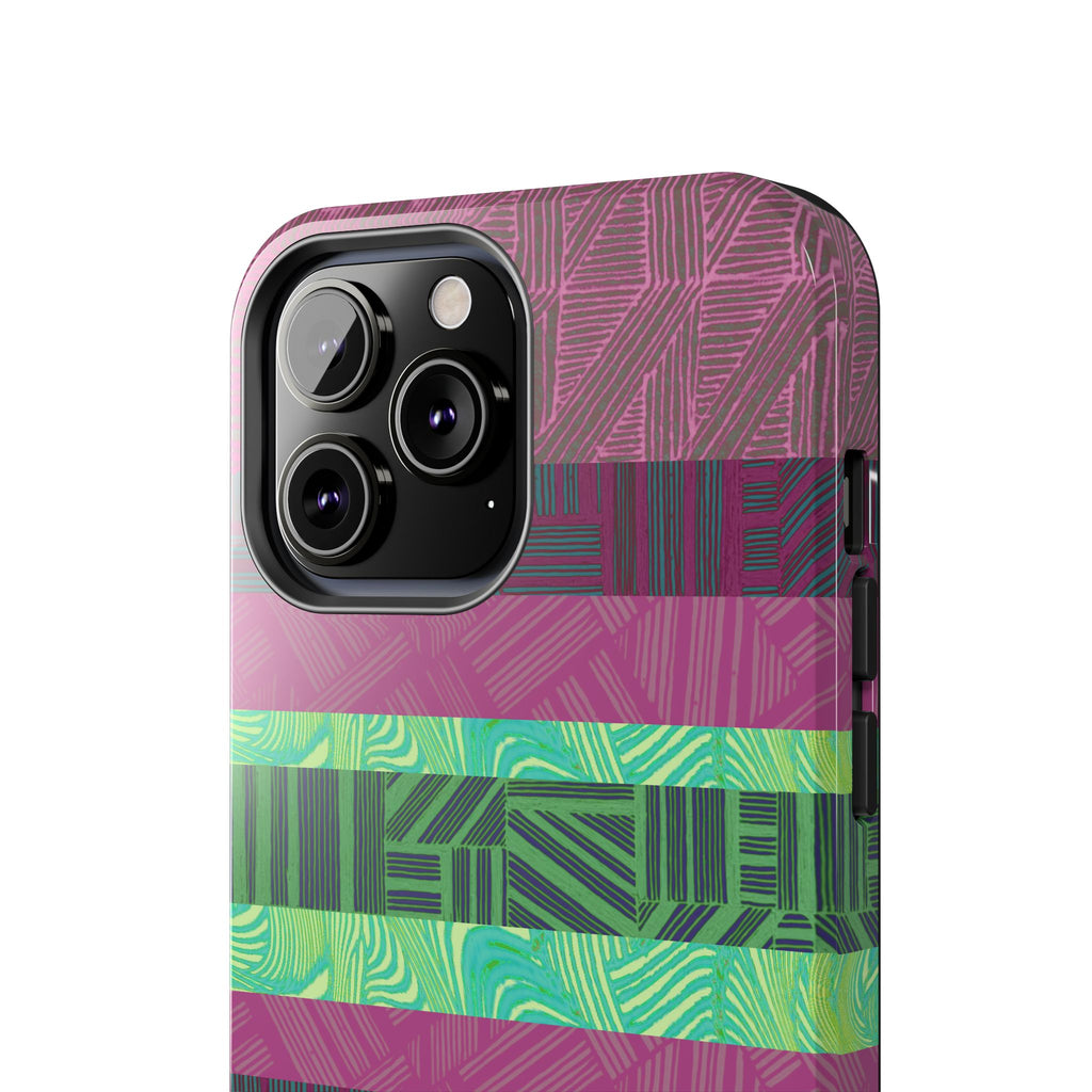 Fractyl glossy protective iphone 18 pro max case, Geometric Stripes Tough Phone Case — Purple & Teal Tribal Pattern, modern phone accessory beside laptop and earbuds