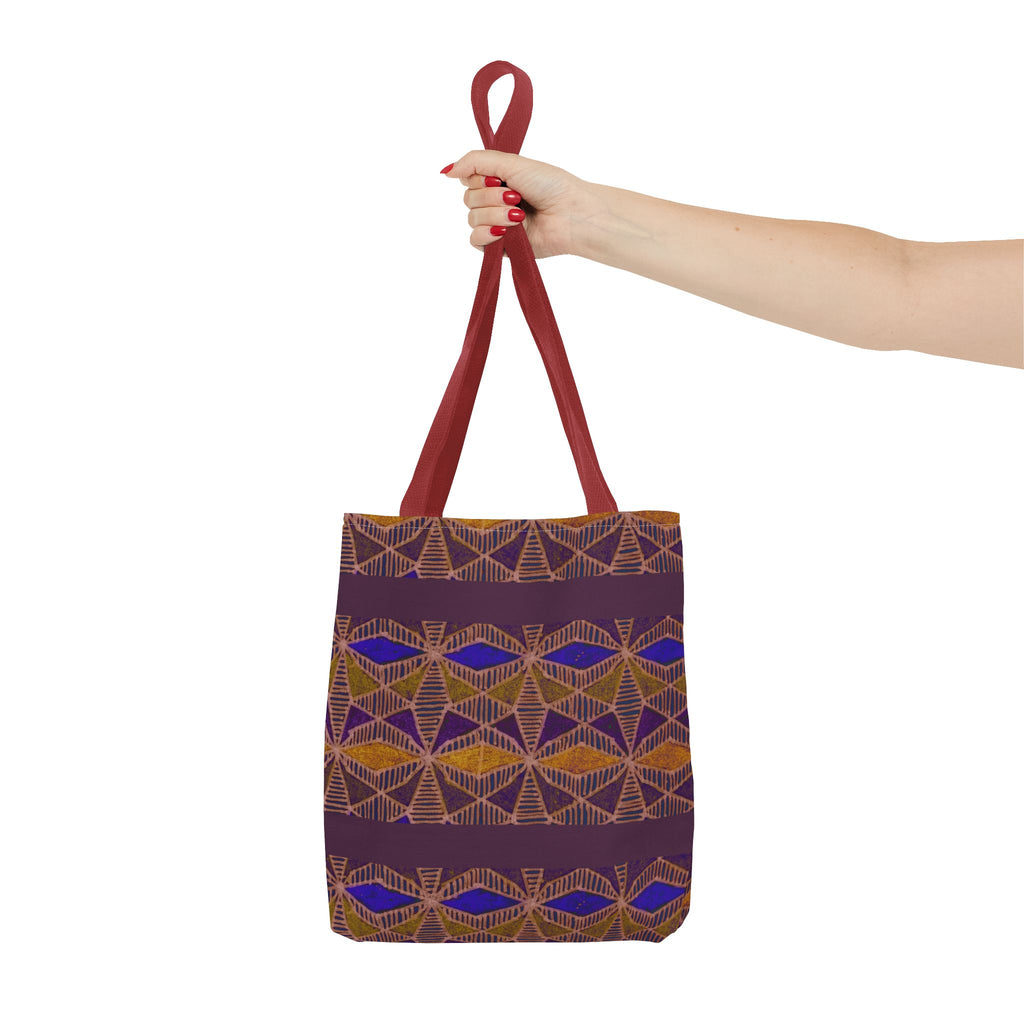 Bohemian Geometric Pattern Tote Bag — Purple & Gold All-Over Print, burgundy printed canvas tote held by hand