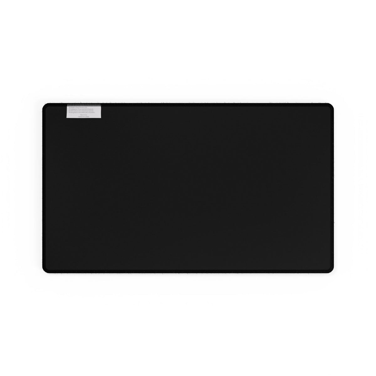 Geometric Teal Desk Mat — Large Patterned Mousepad for Office & Gaming, gaming desk mat shown from below with a black non-slip base and finished stitched border