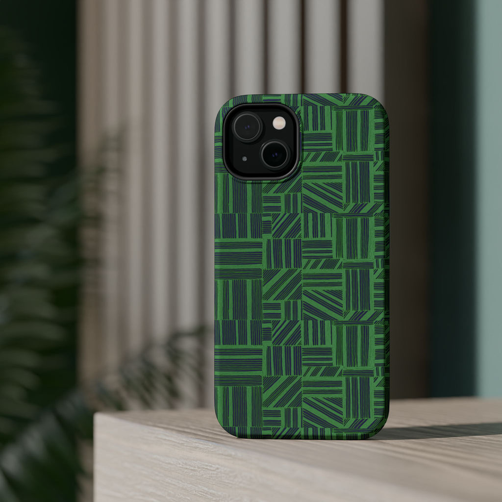 Green Magnetic Phone Case — 2-Layer Geometric MagSafe-Compatible Impact-Resistant Cover, green magnetic phone case- price match with CASETiFY and Casely, floating angled case against a contemporary geometric background.