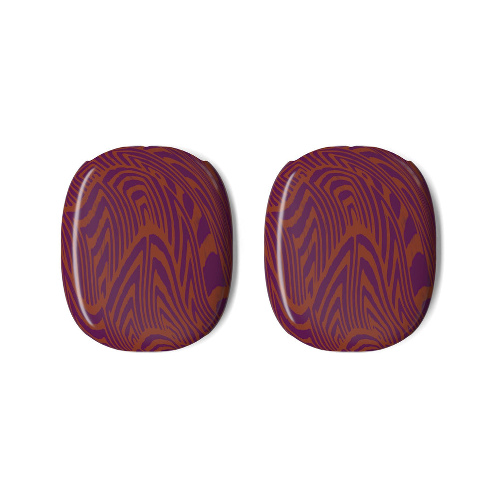 Close-up of the colorful earcup covers with a striking purple and orange woodgrain design. Vintage style earcup shells from Printify, perfect for adding character to your AirPods Max.