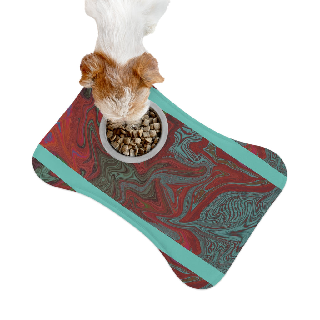 Dog eating from a bowl placed on the Marbled Red & Teal Pet Feeding Mat — Non-Slip Dog & Cat Placemat. The non-slip dog placemat ensures stability during mealtime.