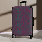 Geometric Plum Carry-On Suitcase – Stylish Patterned Rolling Luggage, angled lifestyle view of an expandable carry on suitcase with bold plum and teal geometric print, hard shell, and smooth rolling wheels.