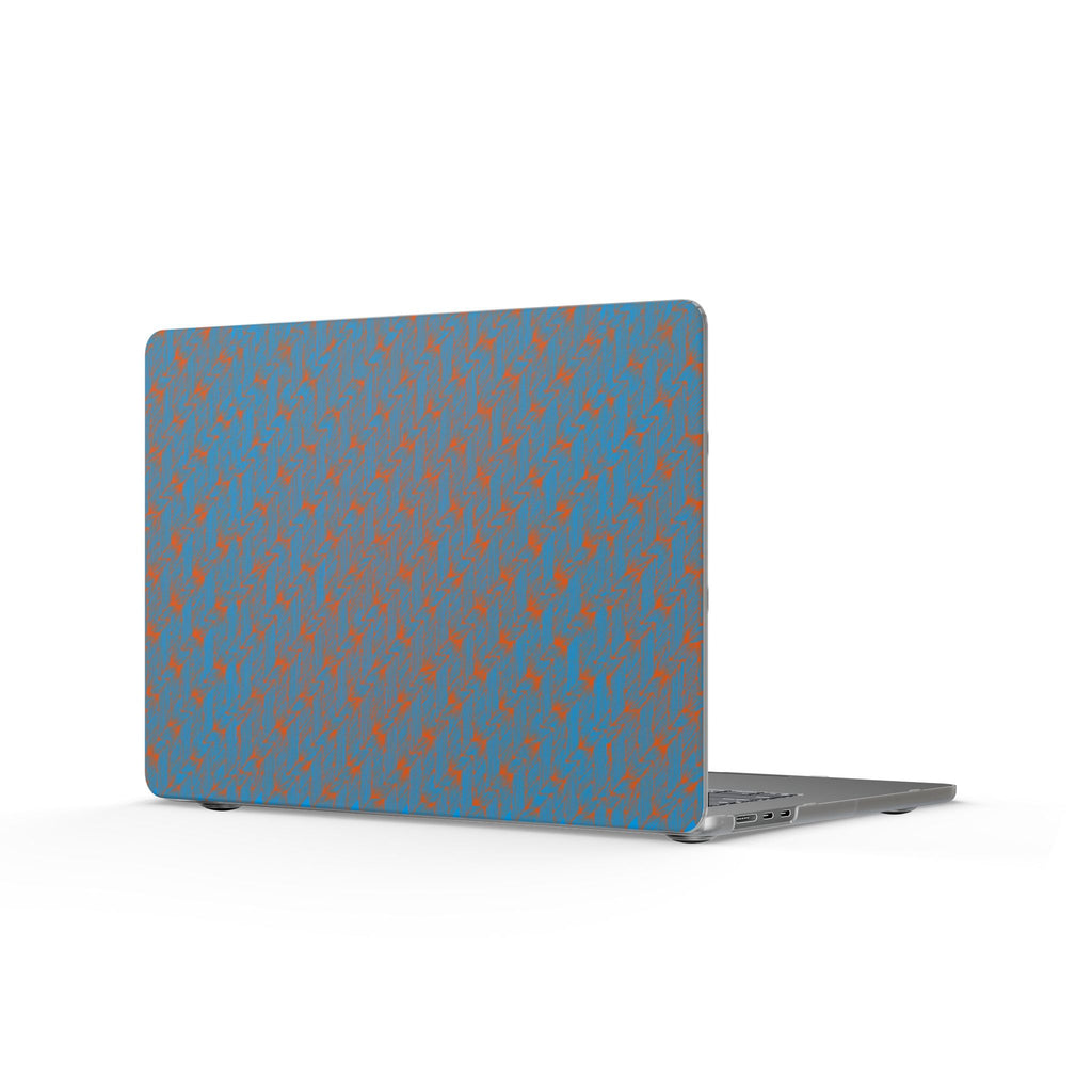 Stylish angle of the Blue Raindrop Matte MacBook Case by Printify, emphasizing a unique waterproof laptop decal pattern. This blue macbook case embodies minimal style and is an excellent everyday carry choice. A thoughtful birthday gift for her or a practical tech accessory for students and teachers, this matte laptop cover ensures a modern touch to any workspace.