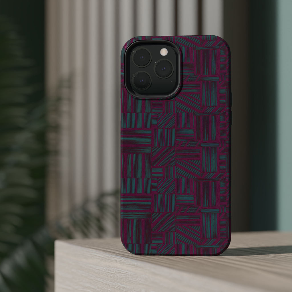 Slim Protective Phone Case With MagSafe, Dual-Layer Impact Protection, Plum Geometric Design, close-up of reinforced case edges and charging port openings; slim protective iphone 16 promax  case.