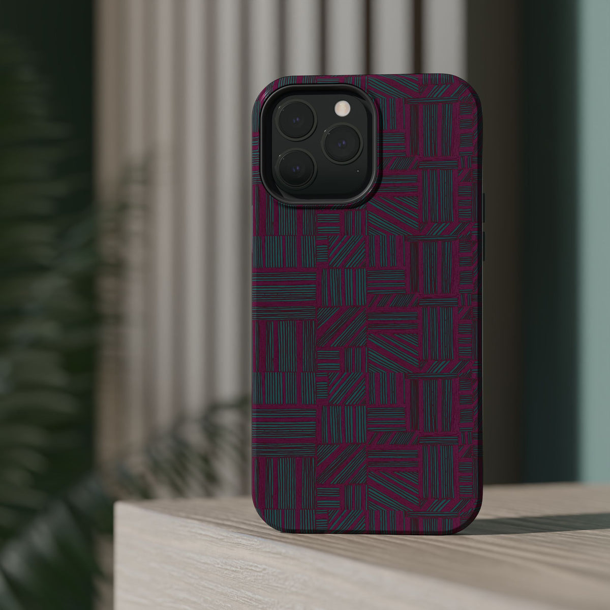 Slim Protective Phone Case With MagSafe, Dual-Layer Impact Protection, Plum Geometric Design, close-up of reinforced case edges and charging port openings; slim protective iphone 16 promax  case.