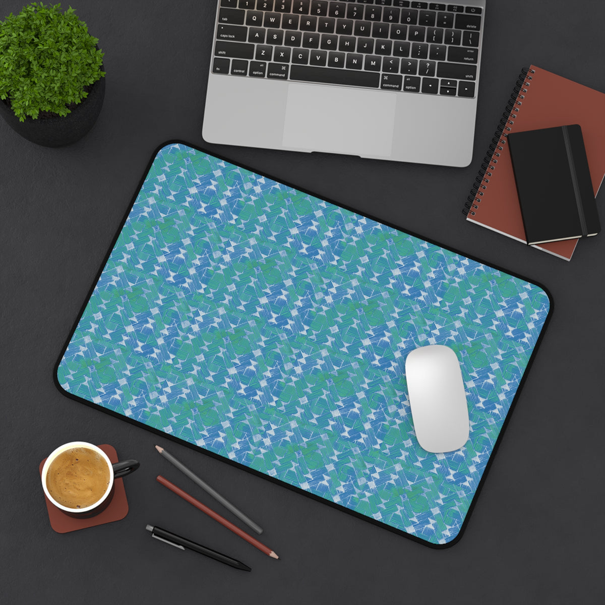 Blue Green Abstract Waves Desk Mat — Patterned Office Mousepad, angled view of a spacious large desk mat beneath a laptop and mouse