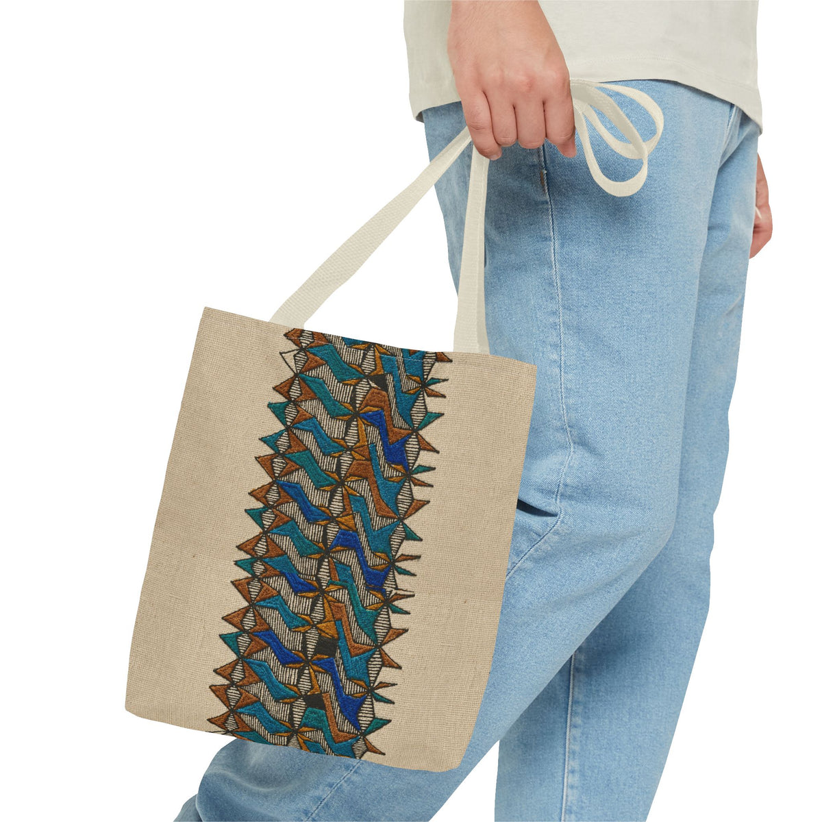Boho Geometric Everyday Patterned Canvas Tote Bag With Reinforced Handles, 3 Sizes, carried with cream handles beside casual blue jeans. Patterned canvas tote combining art tote, beige bag, bohemian bag, boho tote, canvas tote, eco shopping, everyday tote, gift for her, market bag, neutral tote, printed tote, summer tote, and tribal tote features.