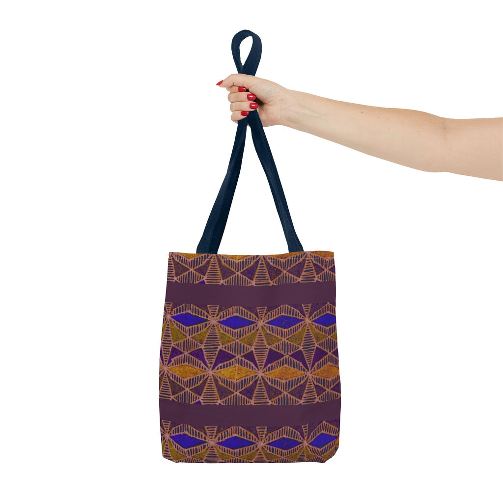 Bohemian Geometric Pattern Tote Bag — Purple & Gold All-Over Print, navy printed canvas tote held by hand for errands and shopping