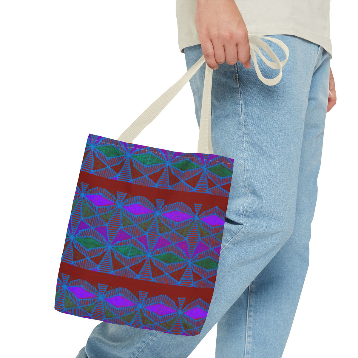Geometric Heart Pattern Tote Bag — Vintage Tribal All-Over Print, model carrying a geometric canvas tote bag with cream handles