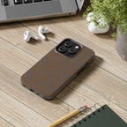 Tough Phone Case — Geometric Maze Brown Protective Cover, wireless charging iphone 18 pro max case shown beside a laptop and earbuds on a desk.