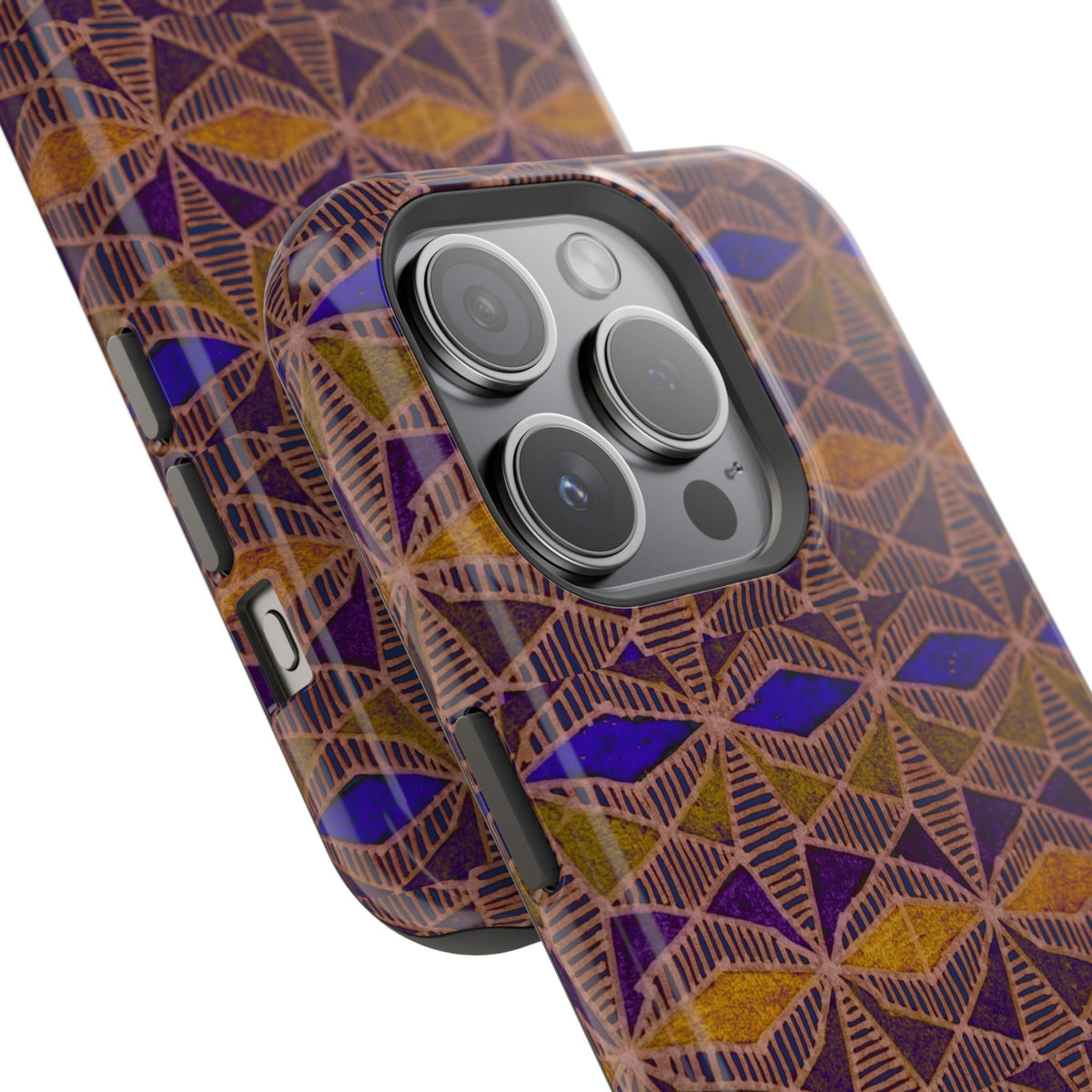 Phone Case — Geometric Tribal Pattern Magnetic Impact-Resistant Case, Fractyl impact resistant iphone 16 pro case standing on a tabletop with bold purple and amber artwork.
