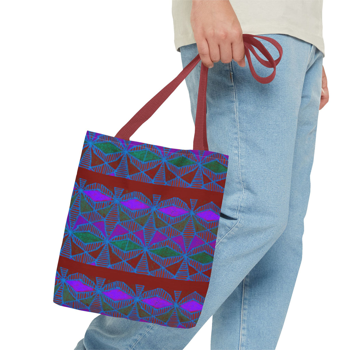 Geometric Heart Pattern Tote Bag — Vintage Tribal All-Over Print, model carrying a geometric canvas tote bag with burgundy handles
