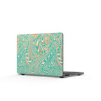 Close-up of the Marbled Teal Matte MacBook Case featuring an artistic swirl pattern, an ideal scratch-resistant MacBook cover for modern aesthetics.