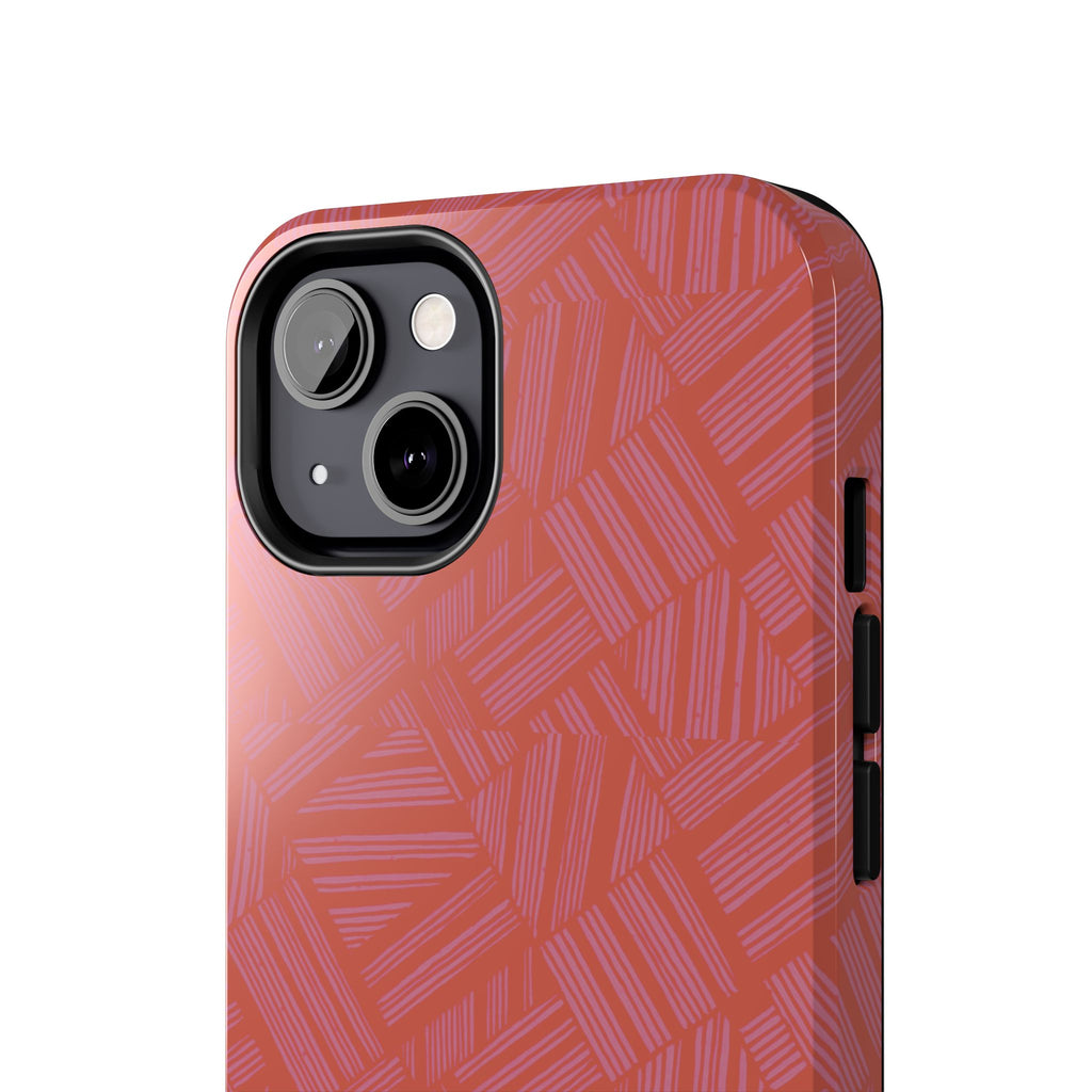 Tough Phone Case — Geometric Coral Pattern Protective Cover, shockproof iphone 18 pro case shown resting on a wooden desk beside a laptop and earbuds