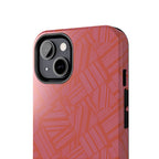 Tough Phone Case — Geometric Coral Pattern Protective Cover, shockproof iphone 18 pro case shown resting on a wooden desk beside a laptop and earbuds
