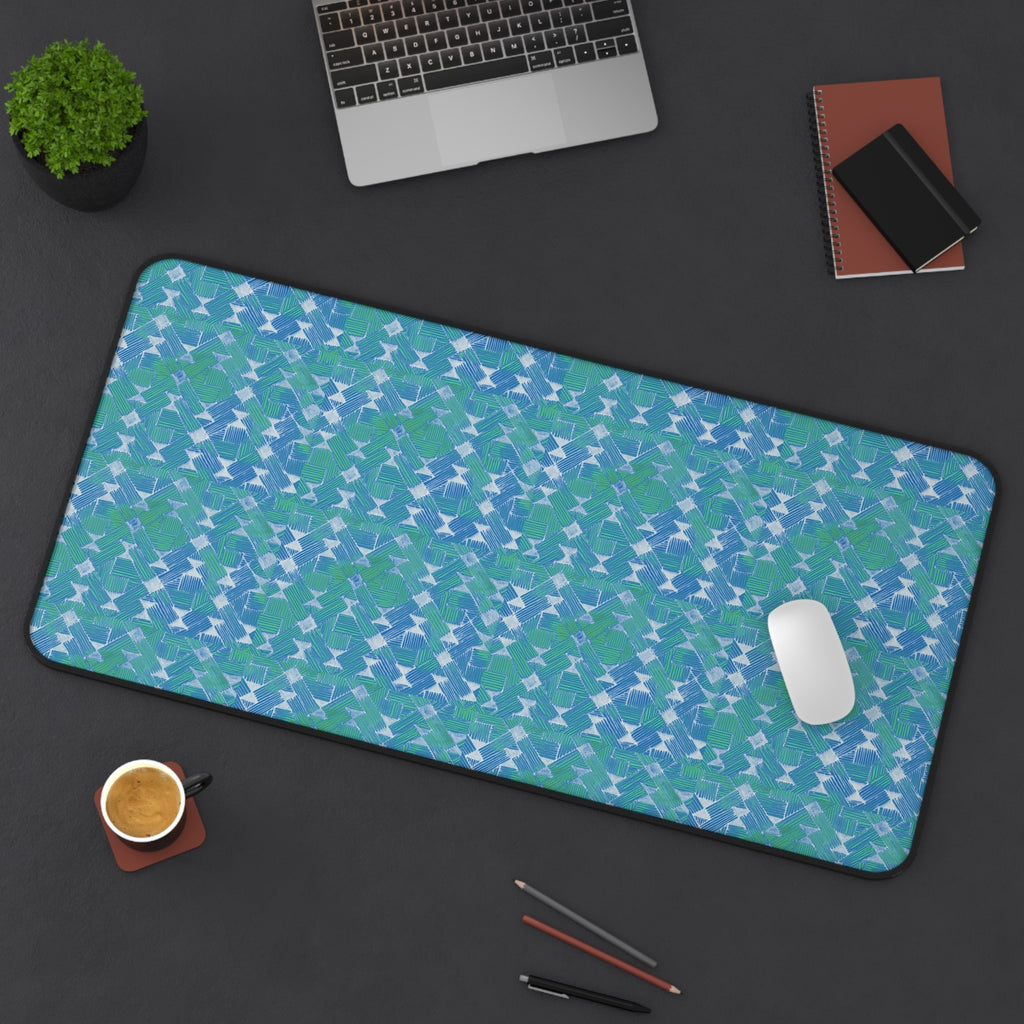 Blue Green Abstract Waves Desk Mat — Patterned Office Mousepad, angled view of a spacious large desk mat with vibrant blue-green waves and office accessories