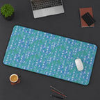 Blue Green Abstract Waves Desk Mat — Patterned Office Mousepad, angled view of a spacious large desk mat with vibrant blue-green waves and office accessories
