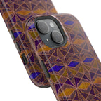 Phone Case — Geometric Tribal Pattern Magnetic Impact-Resistant Case, Fractyl impact resistant iphone 16 pro case displayed upright on a wooden surface with a colorful tribal pattern.