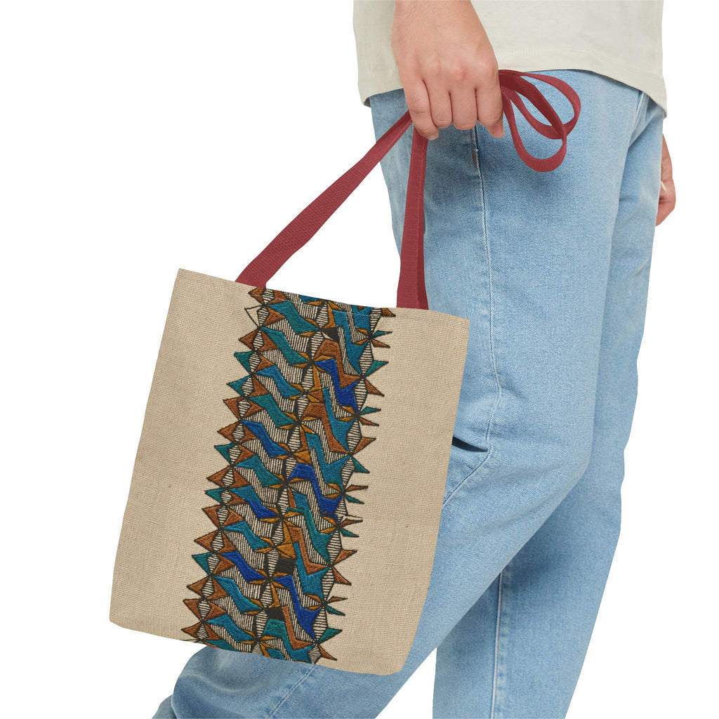 Boho Geometric Everyday Patterned Canvas Tote Bag With Reinforced Handles, 3 Sizes, carried with red handles beside casual blue jeans. This patterned canvas tote combines art tote, beige bag, bohemian bag, boho tote, canvas tote, eco shopping, everyday tote, gift for her, market bag, neutral tote, printed tote, summer tote, and tribal tote appeal.