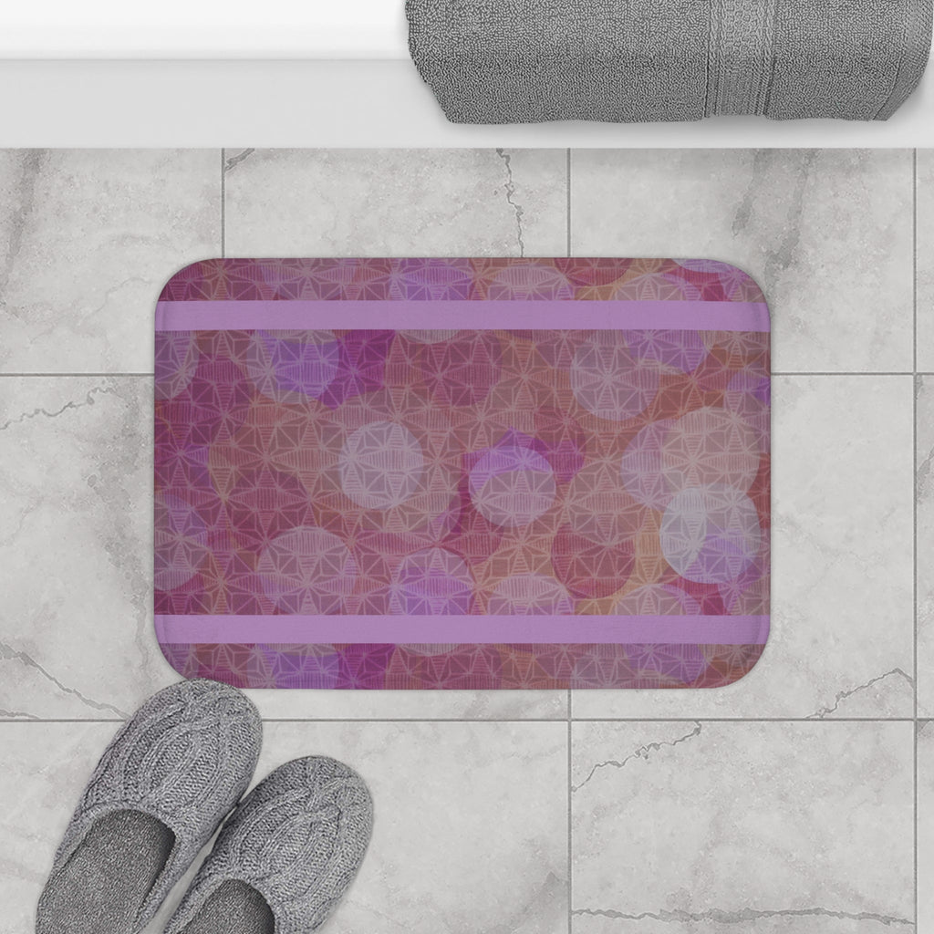 The Pastel Geometric Bath Mat — Lavender Pink Bokeh Floor Rug placed in a serene bathroom setting, surrounded by plush towels and a relaxing ambiance. This anti-slip floor mat is a perfect addition to your girly bathroom decor, characterized by its boho and geometric designs. Transform your spa bathroom with this luxury bath mat that makes for a delightful gift for her.