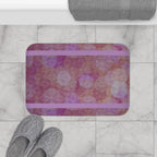 The Pastel Geometric Bath Mat — Lavender Pink Bokeh Floor Rug placed in a serene bathroom setting, surrounded by plush towels and a relaxing ambiance. This anti-slip floor mat is a perfect addition to your girly bathroom decor, characterized by its boho and geometric designs. Transform your spa bathroom with this luxury bath mat that makes for a delightful gift for her.
