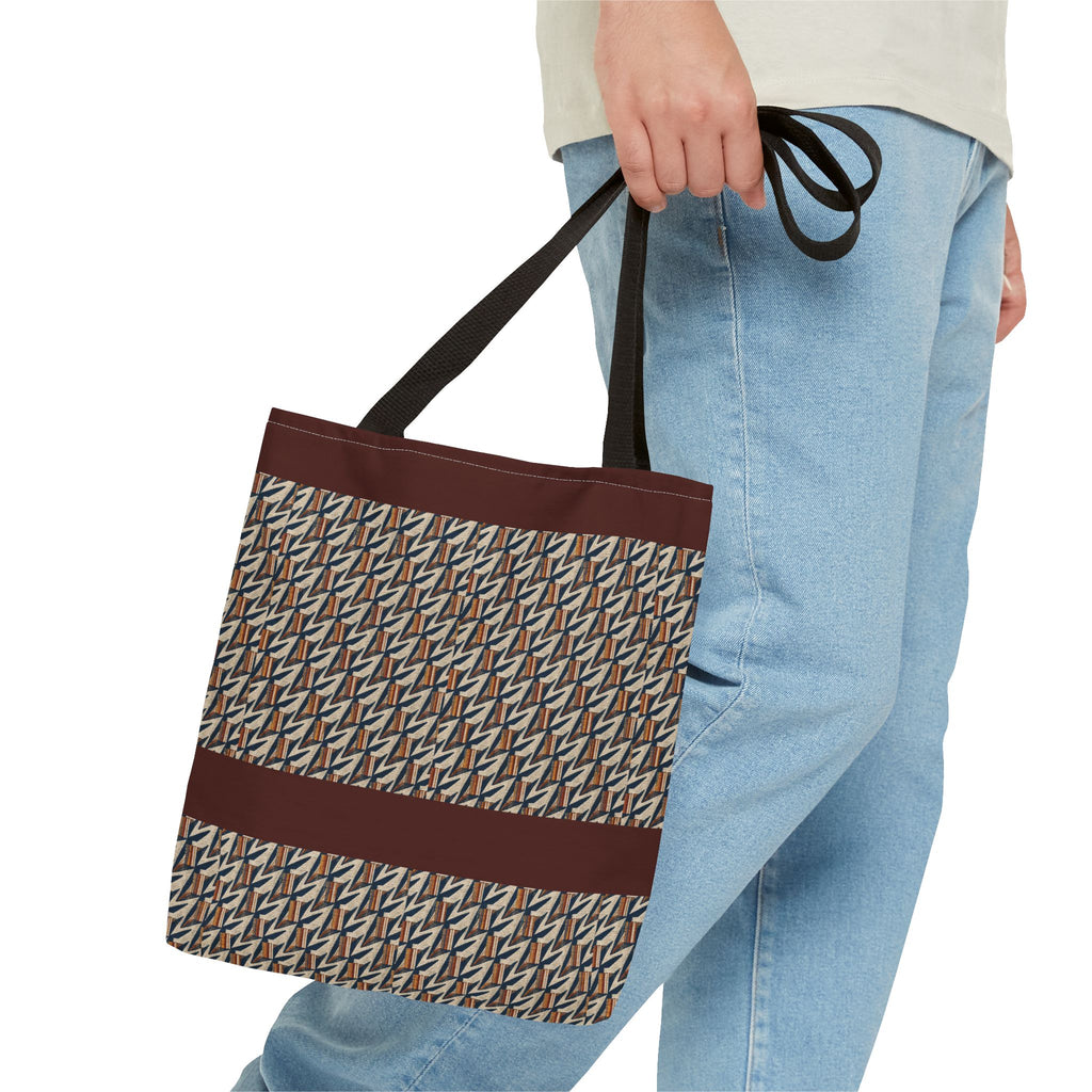 Geometric Retro Stripe Tote Bag – Vintage Brown Patterned AOP Tote carried by hand with black handles, large everyday cotton tote