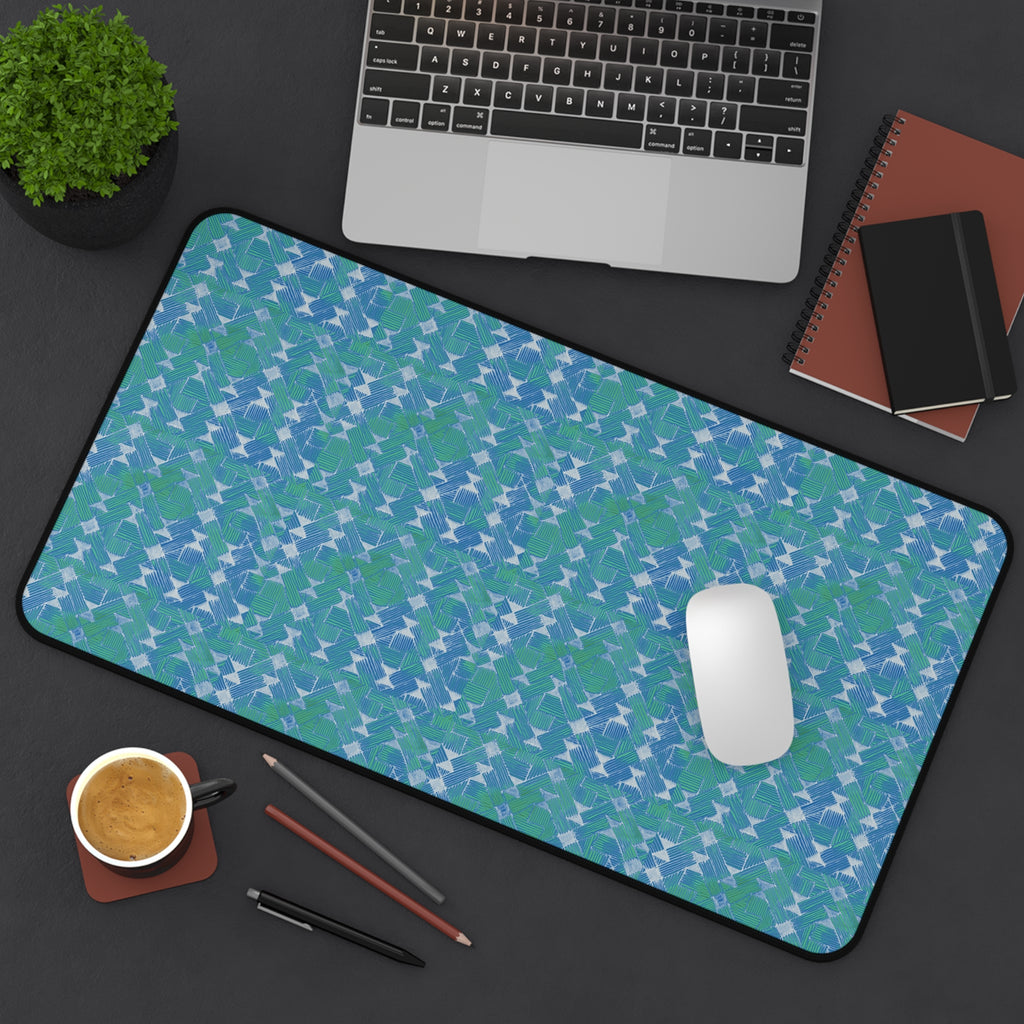 Blue Green Abstract Waves Desk Mat — Patterned Office Mousepad, angled large desk mat displaying a colorful abstract wave surface with laptop and mouse