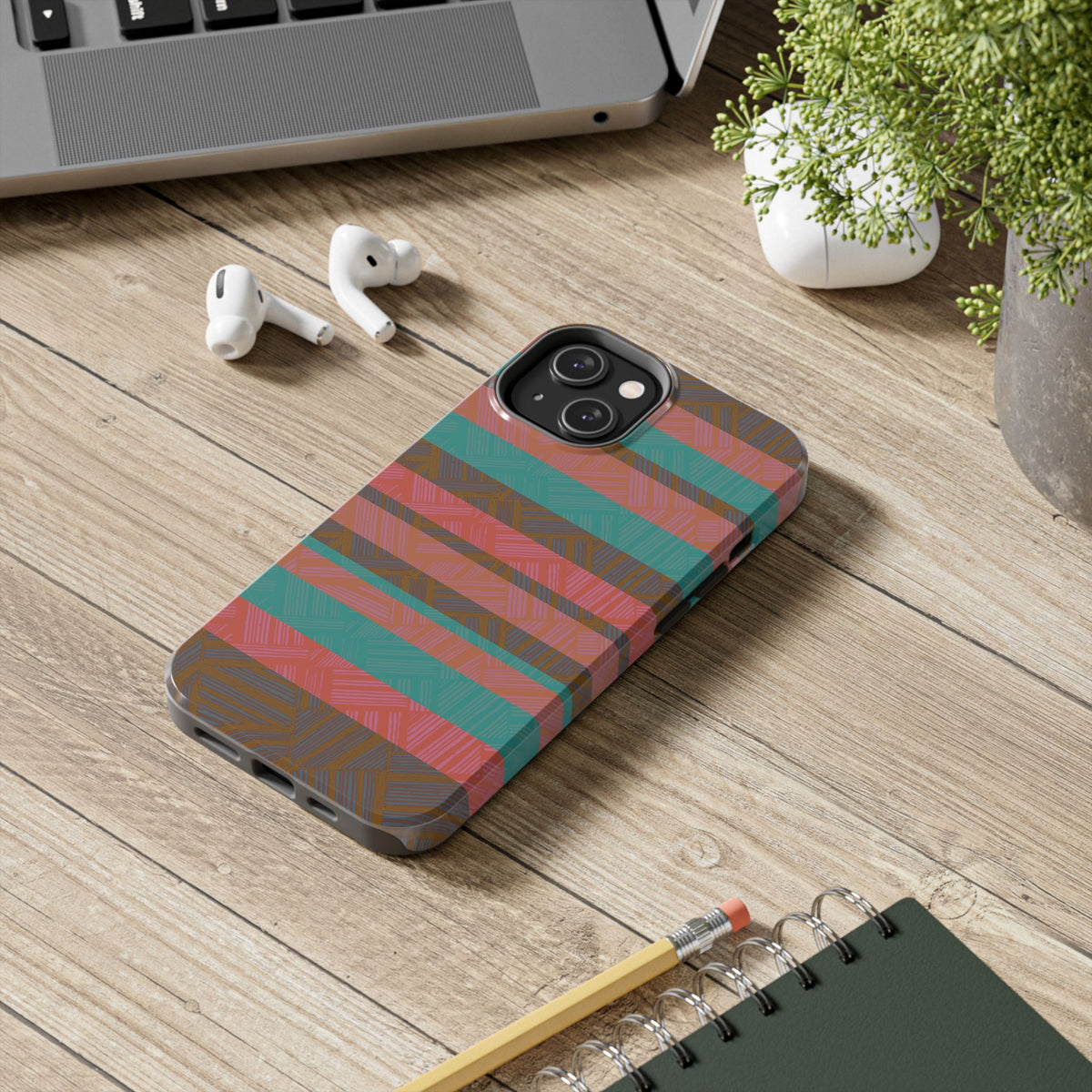 Striped Tribal Tough Phone Case — Retro Teal & Coral Protective Cover angled to show its slim protective profile as a fractyl shockproof iphone 17 pro case