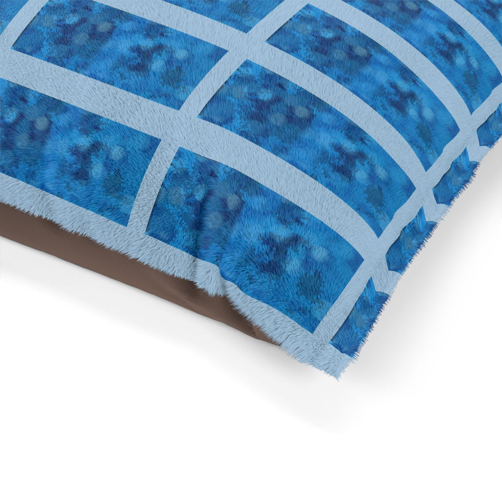 Close-up of the Blue Grid Plush Pet Bed by Printify, showcasing its plush coral fleece and durable cotton duck underside, highlighting its quality as a waterproof dog bed.