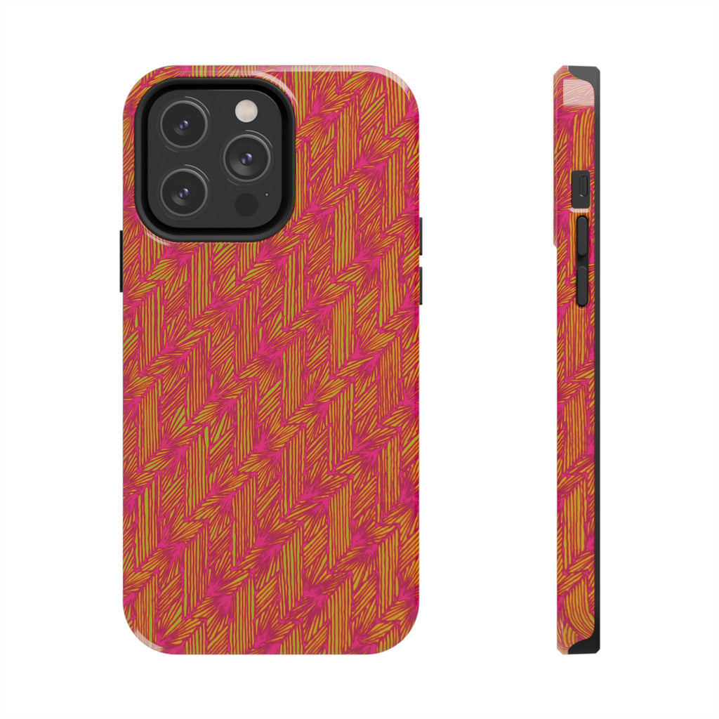 Tough Phone Case — Vibrant Tropical Herringbone Pattern, impact resistant iphone 17 case displayed on a desk with laptop and earbuds