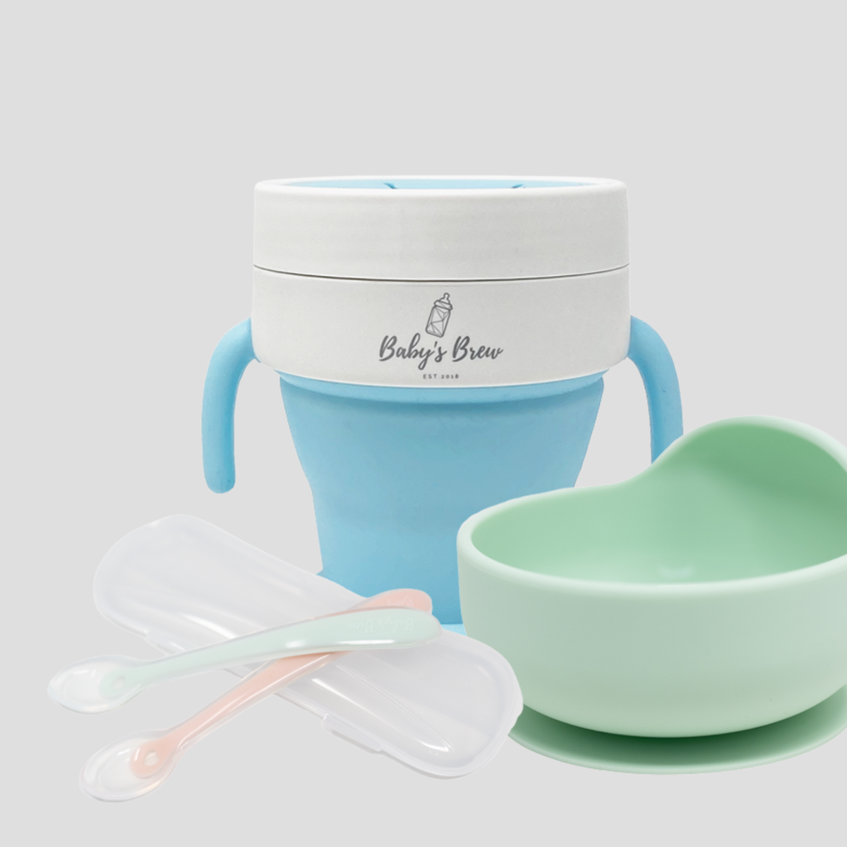 Bite Size Bundle Baby's Brew toddler feeding set in blue and green with snack cup, bowl, and spoons