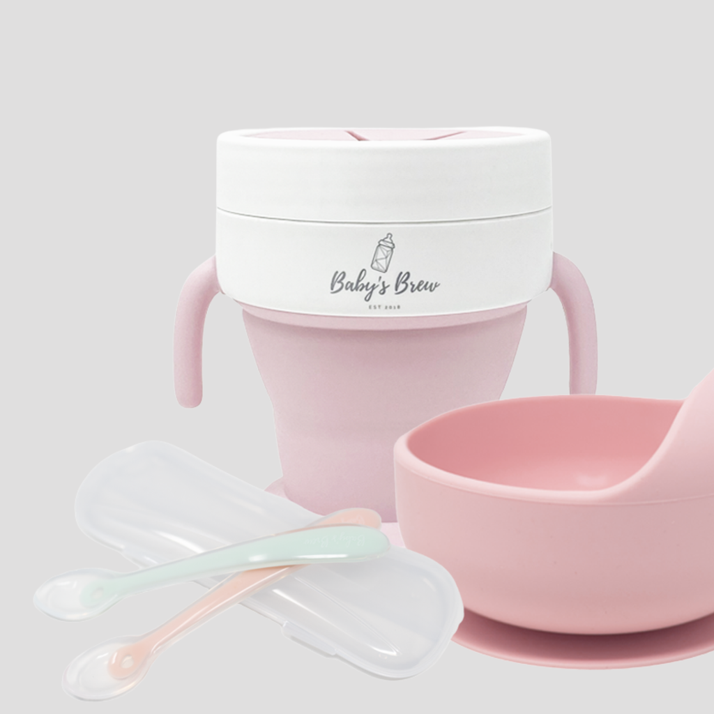 Bite Size Bundle Baby's Brew toddler feeding set with pink snack cup, silicone suction bowl, and flexible spoons
