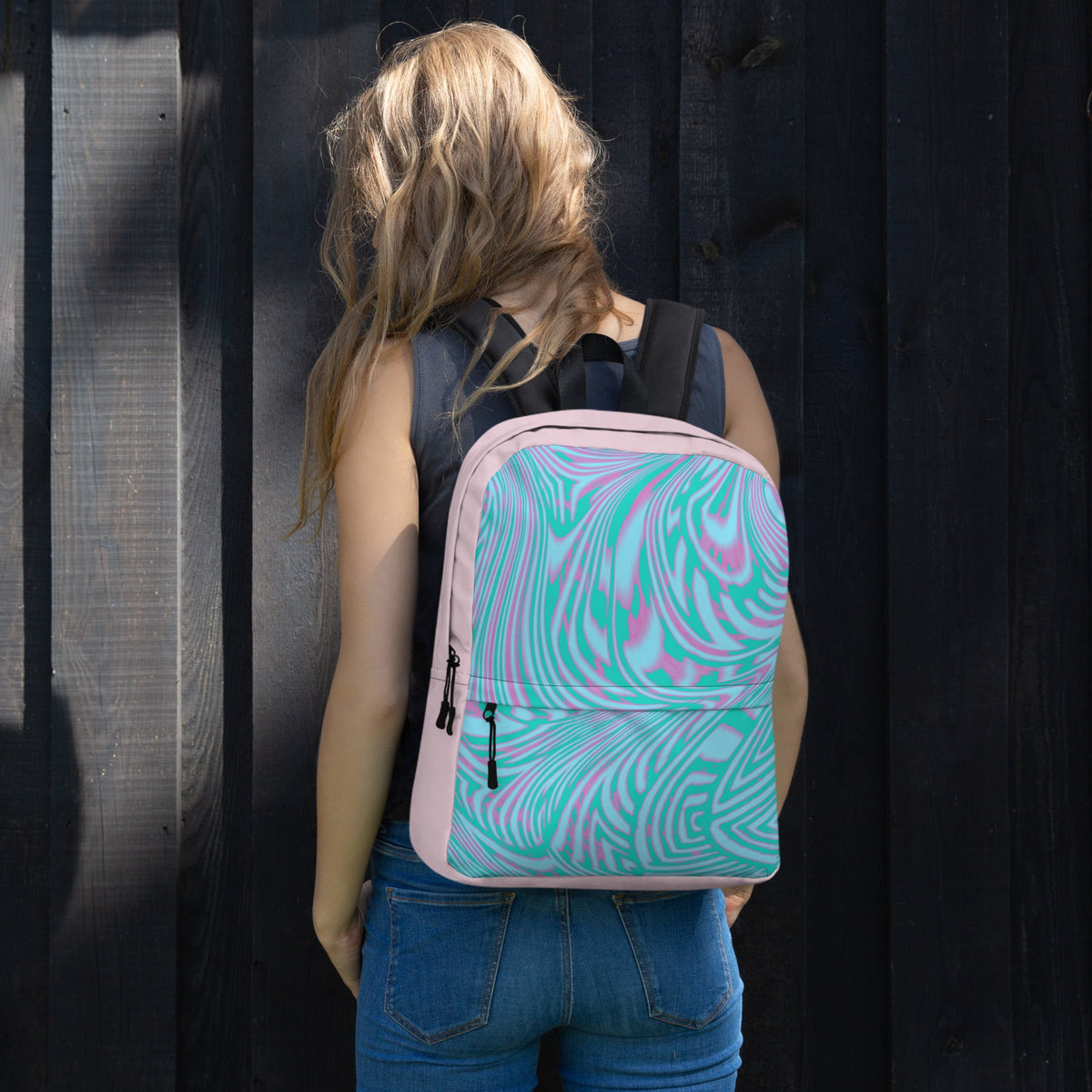 Back view of a woman carrying a vibrant pink and green back to school bag packs, designed for comfort and practical storage.