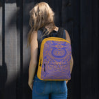 Female model showcasing a colorful backpack with a unique pattern, ideal for back to school activities.
