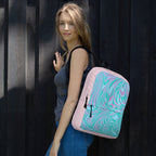 Stylish pink and green back to school bag packs worn by a woman on her shoulder, perfect for daily use or sports activities.
