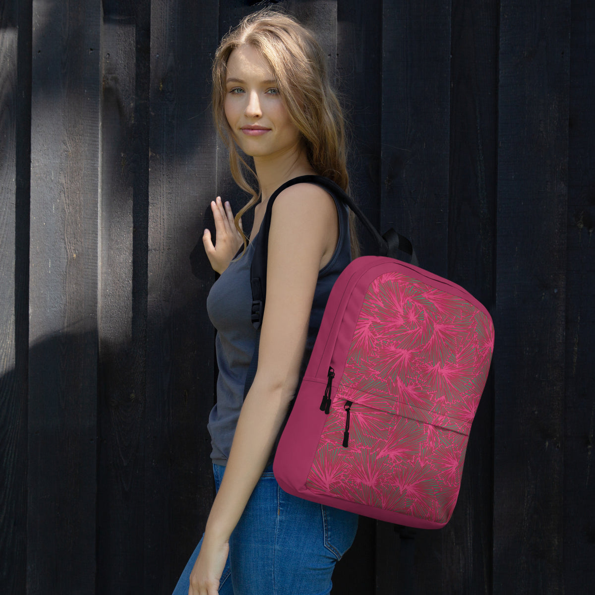 Trendy pink backpack with floral design worn casually, perfect for students. Ideal apple back to school bag pack for daily use and sports activities.