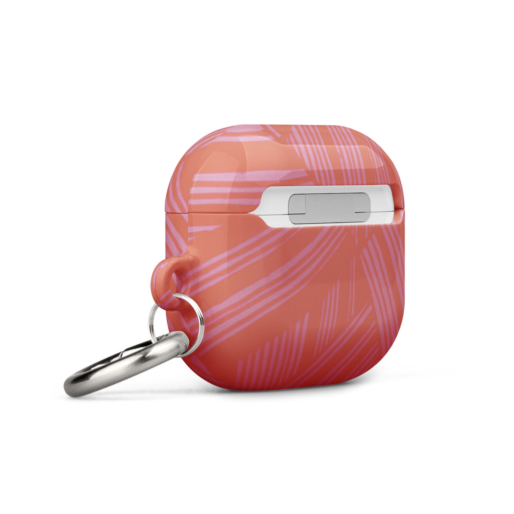 Angled side view of the coral Case for AirPods® with charging access and attached metal carabiner; protective airpods gen 2 case with carabiner.