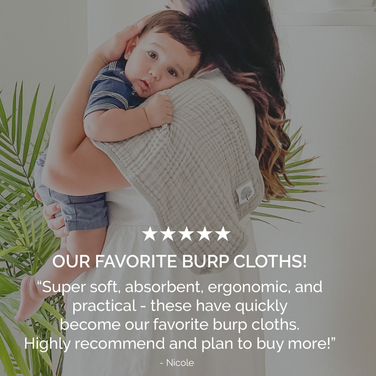 Butterfly Set - Muslin Burp Cloths (4 Pack) absorbent burp cloths for under 2, worn over a mother's shoulder while holding a toddler.