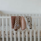 Butterfly Set - Muslin Burp Cloths (4 Pack) absorbent burp cloths for under 2, draped over a white crib rail.