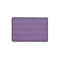 Showcasing a large desk mat in purple with intricate diamond patterns, ideal for both gaming and work environments.