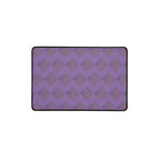 Showcasing a large desk mat in purple with intricate diamond patterns, ideal for both gaming and work environments.