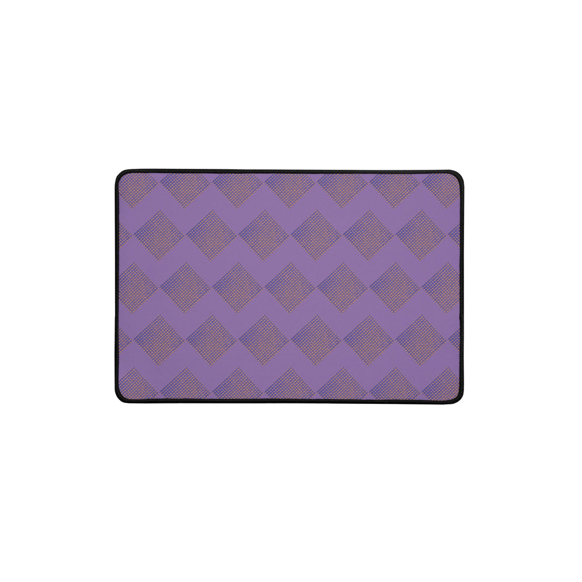 Showcasing a large desk mat in purple with intricate diamond patterns, ideal for both gaming and work environments.